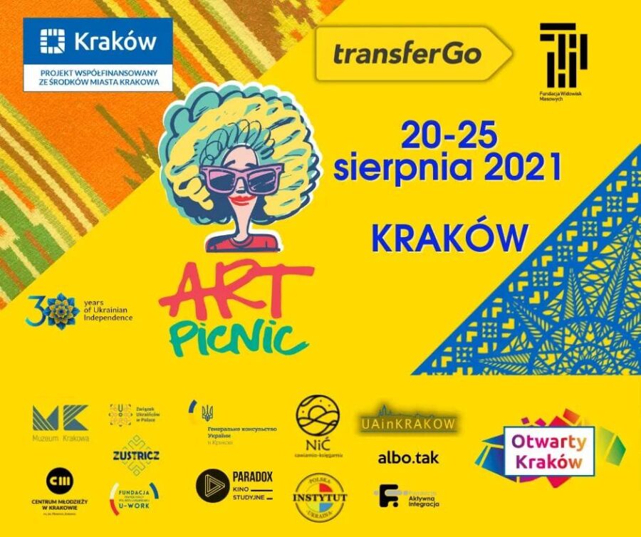 Plakat reklamujący czwarty Art-Piknik Ukraiński w Krakowie. Baner w kolorze żółtym z ludowymi dekoracjami charakterystycznymi dla Ukrainy. Logotypy organizatora i partnerów wydarzenia