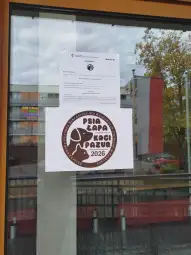 Plakat informacyjny o wydarzeniu "Psia Łapa, Koci Pazur 2026" z logo i danymi kontaktowymi.