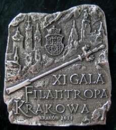 Herb Krakowa i zarys Krakowa w kamieniu