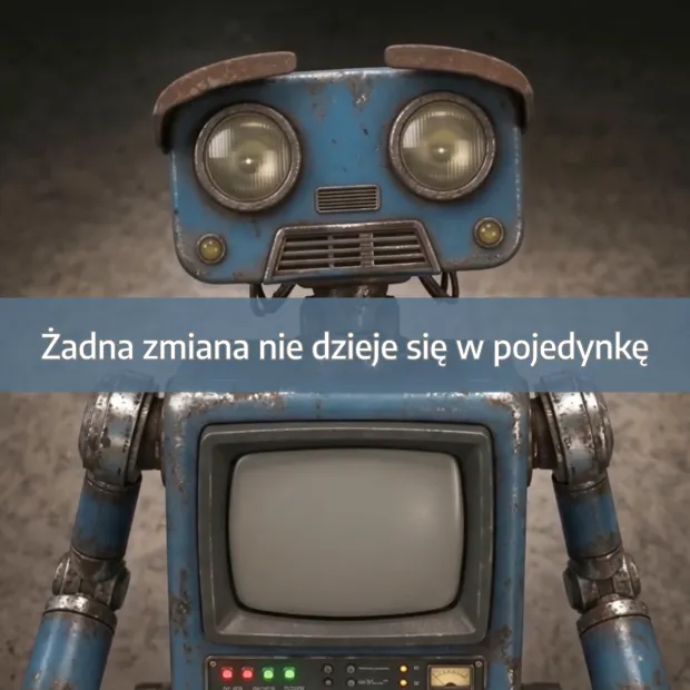 Robot z telewizorem jako głową, z napisem o zmianach.