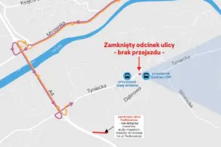 Zamknięty odcinek ul. Tynieckiej w Krakowie, z informacjami o objazdach i komunikacji.