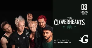 Zespół The Cloverhearts, sześć osób w różnorodnych stylizacjach, z kolorowymi włosami.