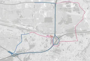Mapa z trasami w dwóch kolorach, pokazująca alternatywne drogi w mieście.