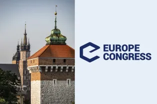 Zamek z wieżą i logo Europe Congress.