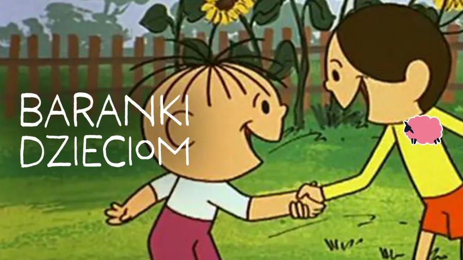 Dzieci bawią się na świeżym powietrzu, trzymając się za ręce.