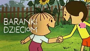Dzieci bawią się na świeżym powietrzu, trzymając się za ręce.